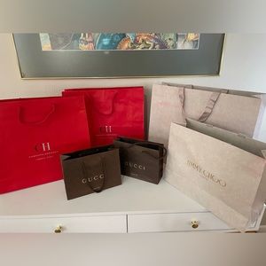 Lot of 7 empty gift bags. Gucci, Carolina Herrera, Jimmy Choo and Chanel